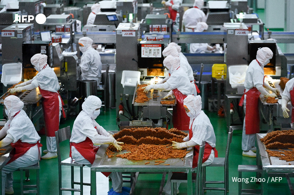 法新社探访中国辣条工厂：特色零食在海外圈粉 配图